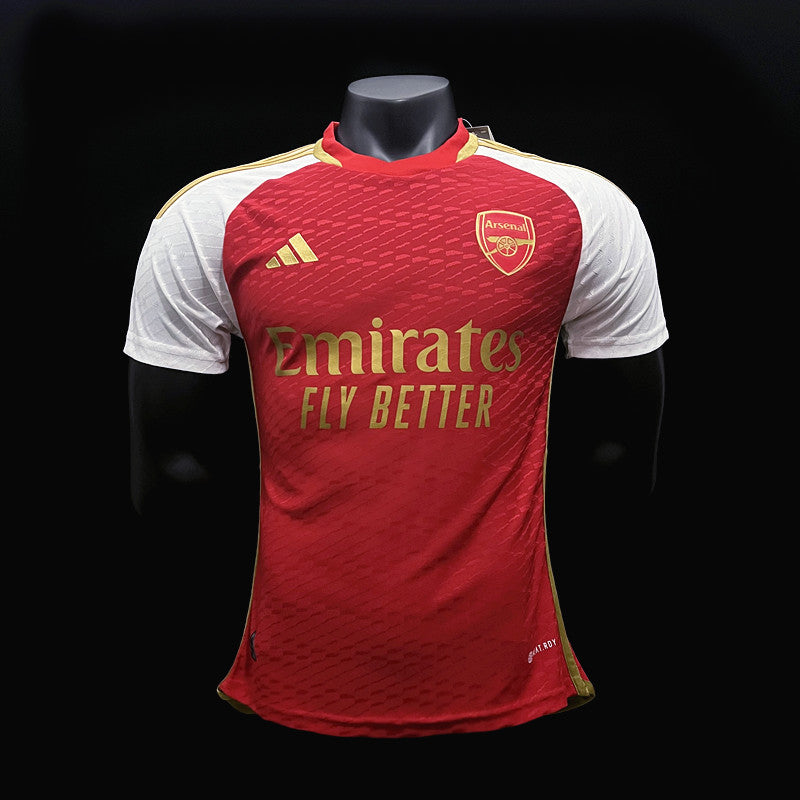 23/24 Versão Jogador Arsenal - Red Gold Shield