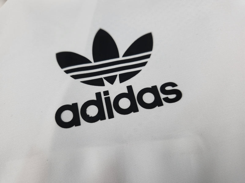 CORTA VENTO adidas trevo branco